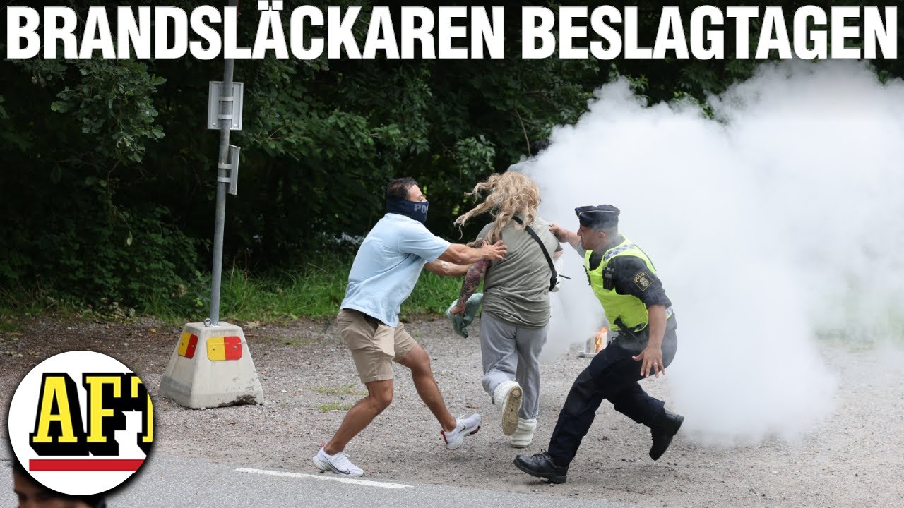 Kvinna stormade koranbränning med brandsläckare